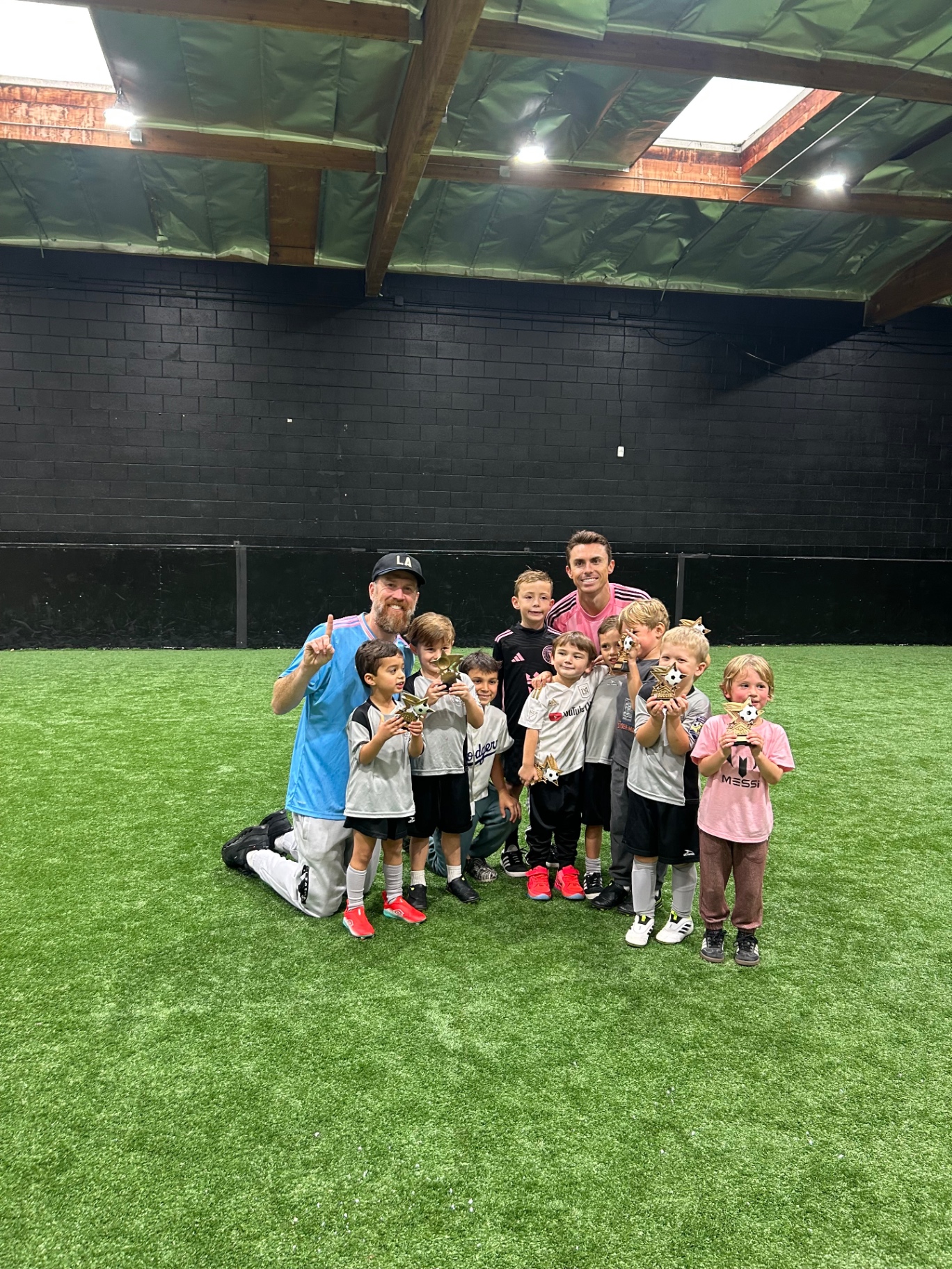 Young players holding trophies after a tournament at Stadium Southbay